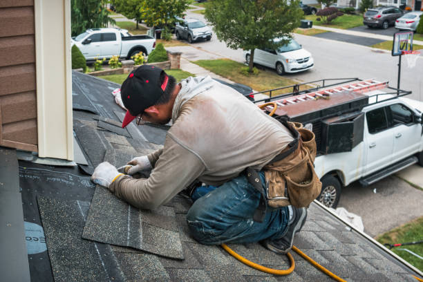 Professional Gutter Installation technician working in Springfield, KY